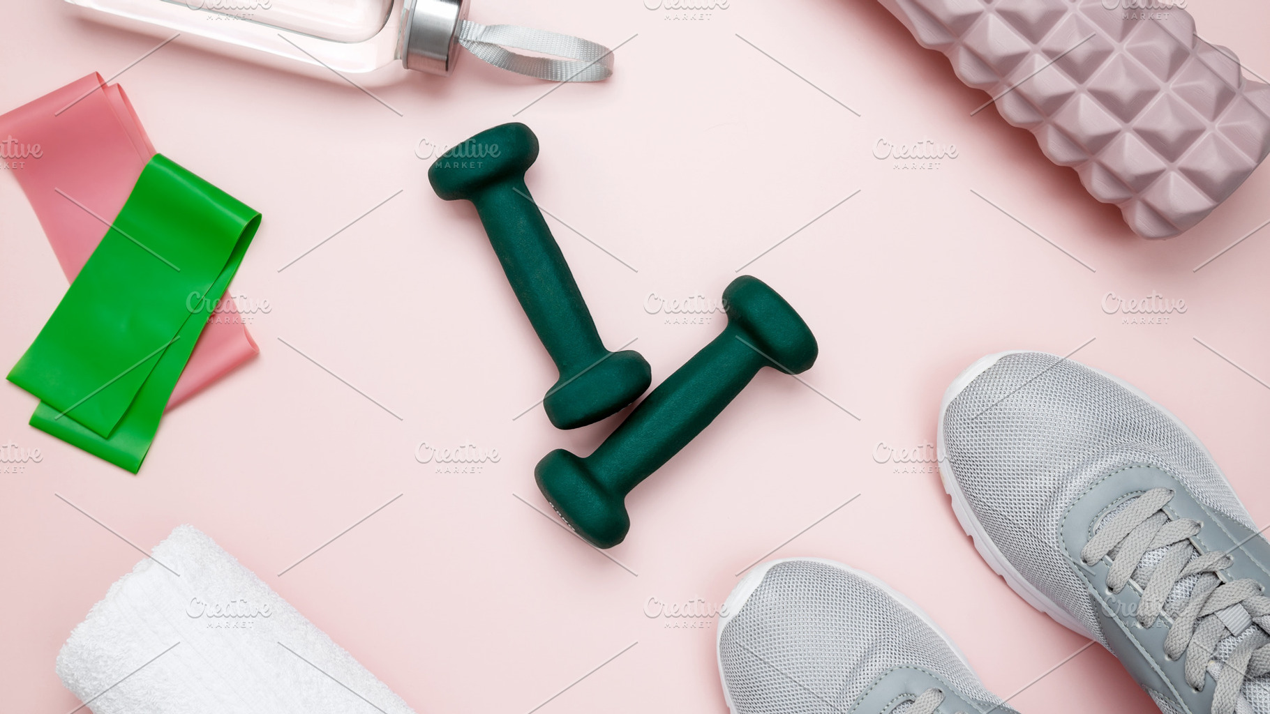 Various accessories for sports and fitness, including sneakers, dumbbells, foam, a Photo by matucha