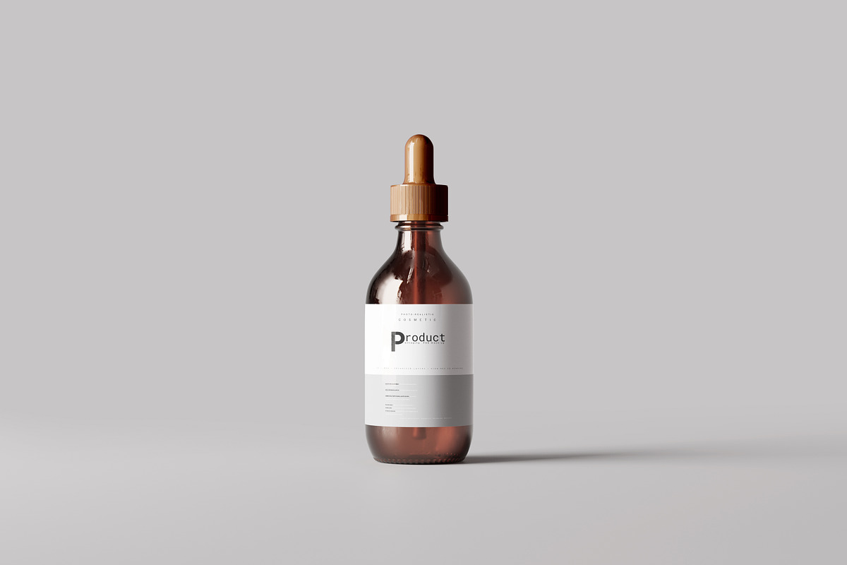 Amber Glass Dropper Bottle Mockup, a Cups & Container Mockup by pmvch (Photo 1 of 6)