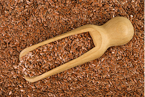 flaxseed in wooden scoop as a, a Food & Drink Photo by NataPhoto