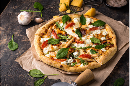 Italian pizza with feta cheese, a Food & Drink Photo by Yulia Furman