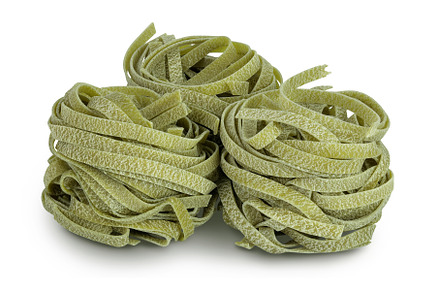 Raw tagliatelle green pasta with, a Food & Drink Photo by NataPhoto