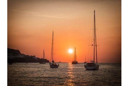 Three boats in sea at sunset in calm, a Nature Photo by ArtOfPhotos photo store