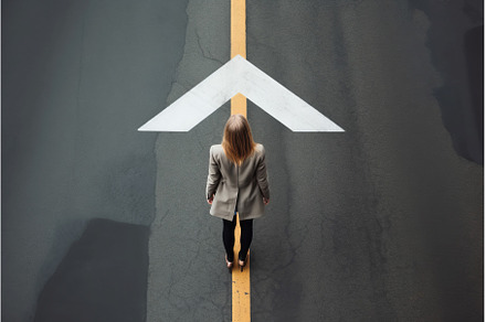Woman on highway asphalt top view, a Transportation Photo by Ylivdesign
