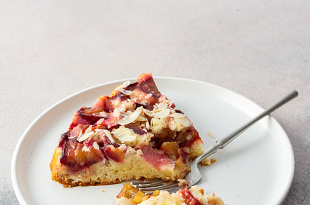 Piece of plum cake on a plate, a Food & Drink Photo by Pandateam