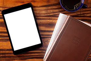 A Tablet with a Bible for LIve Streaming Church Services or Bibl