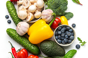 Healthy eating concepts with colorful fresh whole organic ingred, a Photo by Olena Rudo