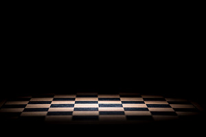 abstract chessboard on dark backgrou