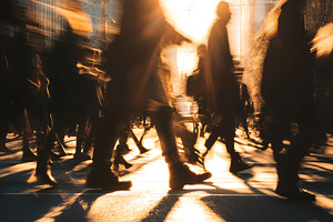 Silhouetted Pedestrians Crossing Busy Urban Street at Sunset with Blurred Motio, a Person Photo by Ocean Digital Art