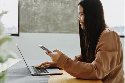 Young asian woman using smartphone