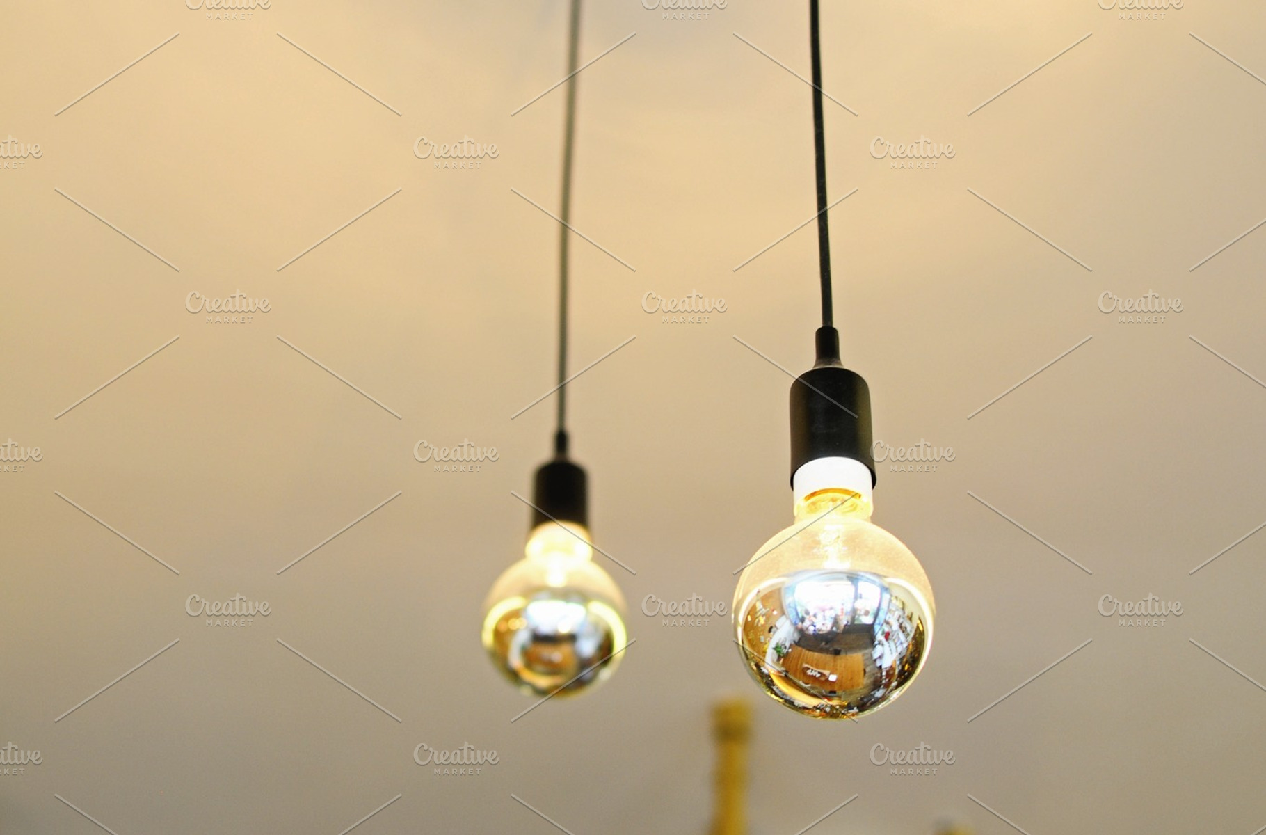 Hanging light bulbs, an Abstract Photo by PEMIKA
