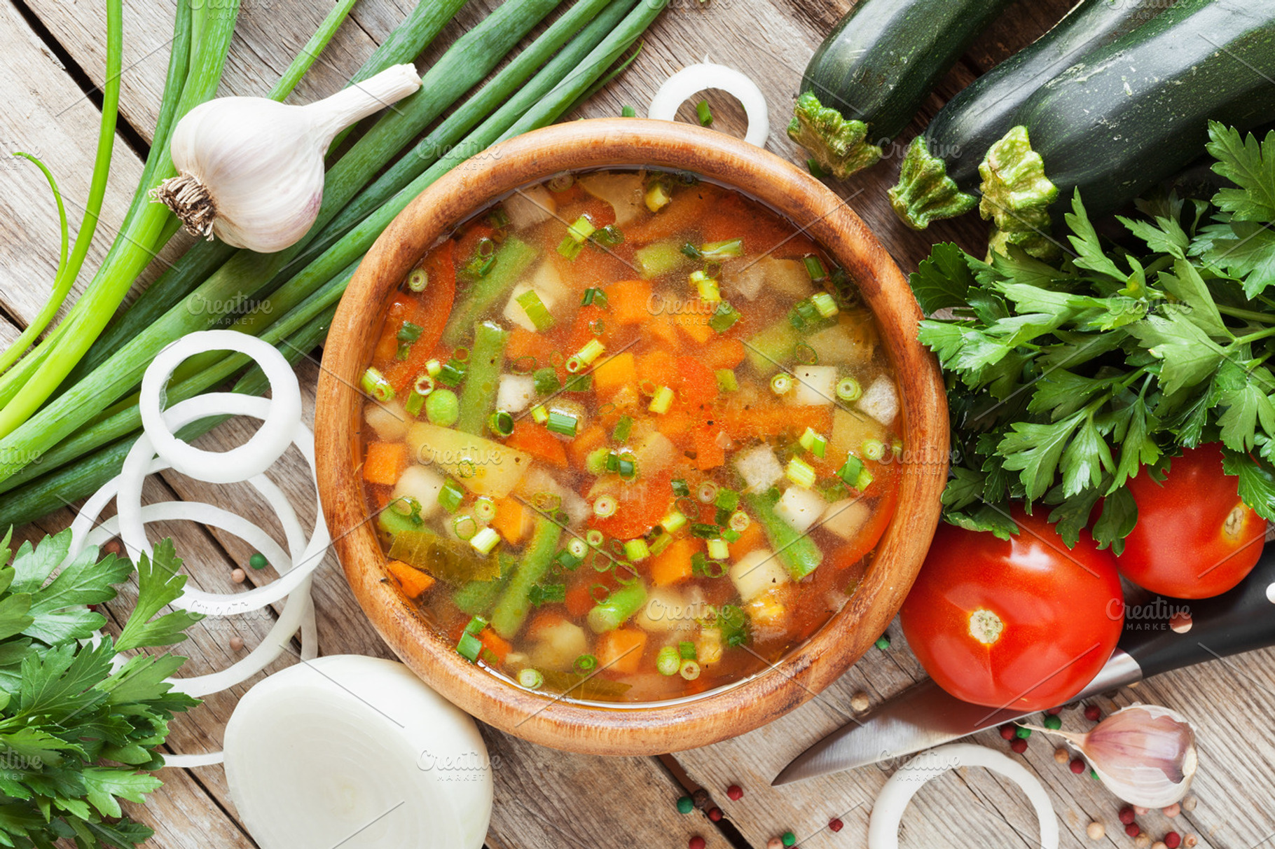 Vegetable soup in wooden bowl, a Food & Drink Photo by chamillewhite