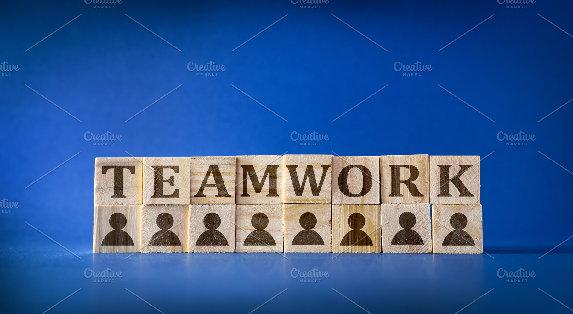 Teamwork Concept with Wooden Blocks and Icons, a Business Photo by Davizro's Market