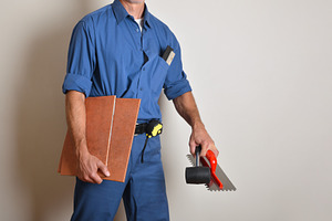 Tiler with work clothes and work tools, a Person Photo by Davizro's Market