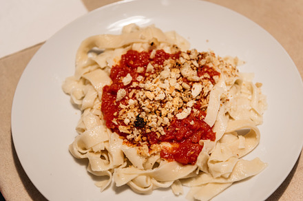 Close-up of dish of homemade pasta with tomato sauce, a Food & Drink Photo by Architect´s eye