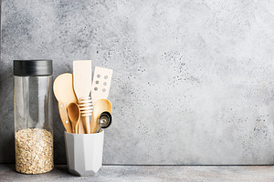 Kitchen gray concrete wall. Shelf