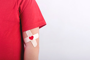 Blood donation concept featuring child, heart, and blood, a Health & Medical Photo by esthermm