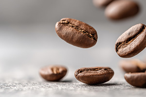 Close up of roasted coffee beans, a Food & Drink Photo by MistyDay