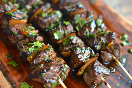 Grilled beef kebabs arranged on a wo, a Photo by Iftikhar Alam