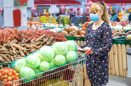 Woman with a cart of vegetables in a, a Person Photo by yanadjana