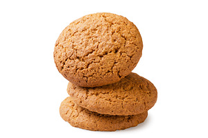 Three oatmeal cookies close-up on a, a Food & Drink Photo by innakreativ