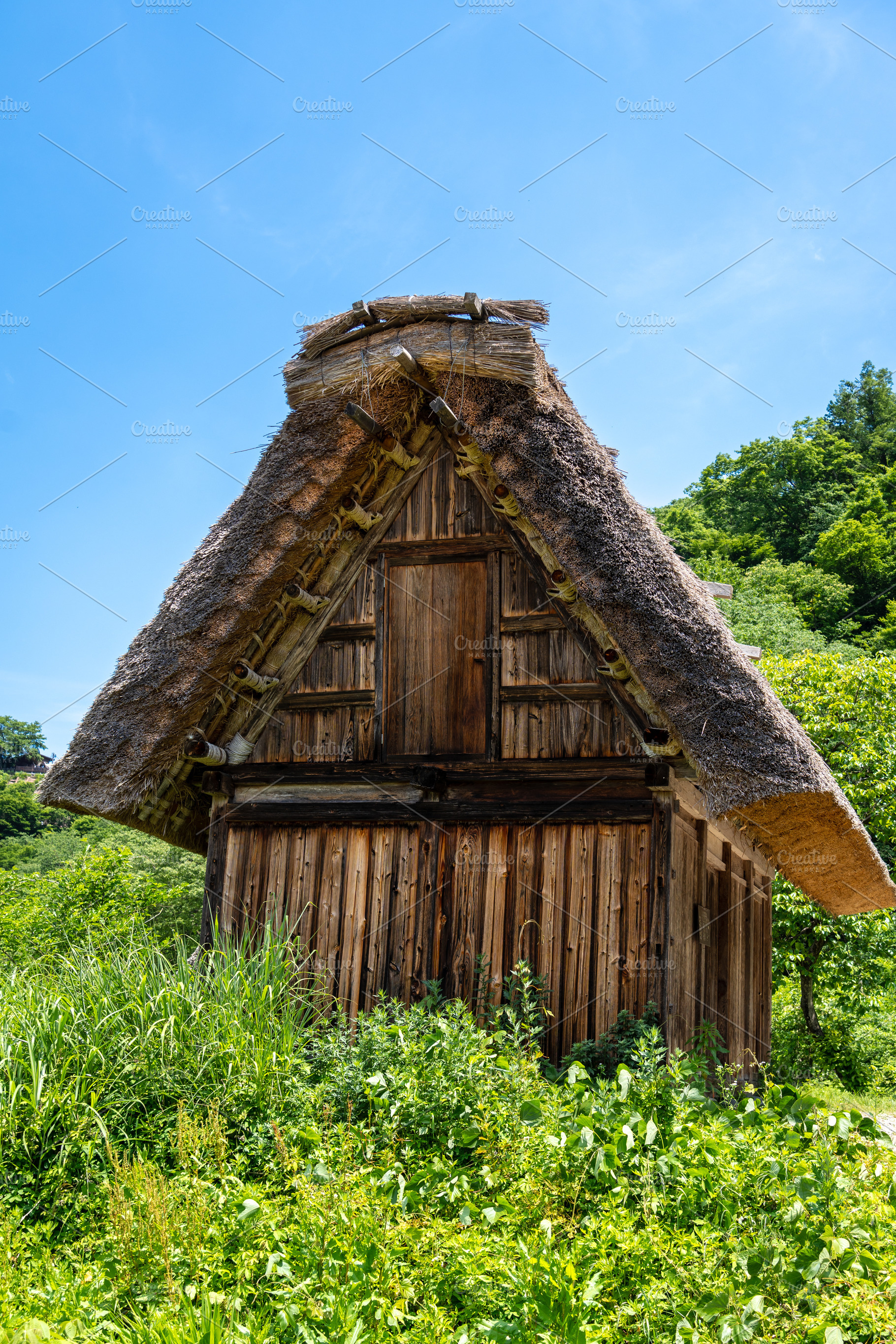 Small traditional wooden house in the peaceful village of Shirak, an Architecture Photo by GoodGoods