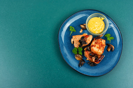 Baked pork medallions with mushrooms, a Food & Drink Photo by MLunov MLunov