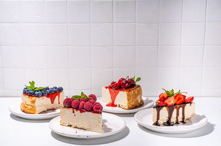 Summer cheesecake slices with various berry, a Food & Drink Photo by Rimma