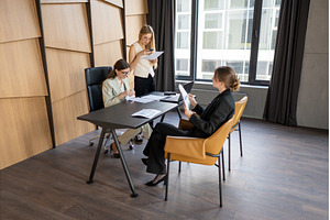 Female-led team managing a branding, a Business Photo by undrey