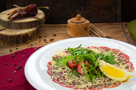 Carpaccio and a lot of greens, a Food & Drink Photo by nafood
