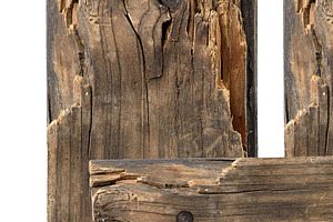 Part of an old wooden fence made of vertical and horizontal boar, a Background Photo by ndanko