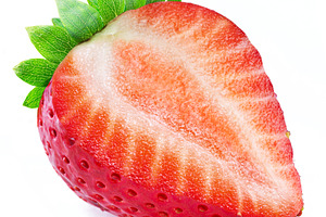 Ripe perfect strawberry cross cut isolated on white background., a Food & Drink Photo by Volff