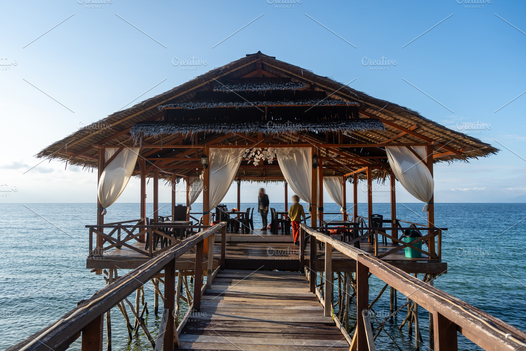 Wooden pier on Lake Poso in Tentena, Sulawesi, Indonesia, an Architecture Photo by GoodGoods