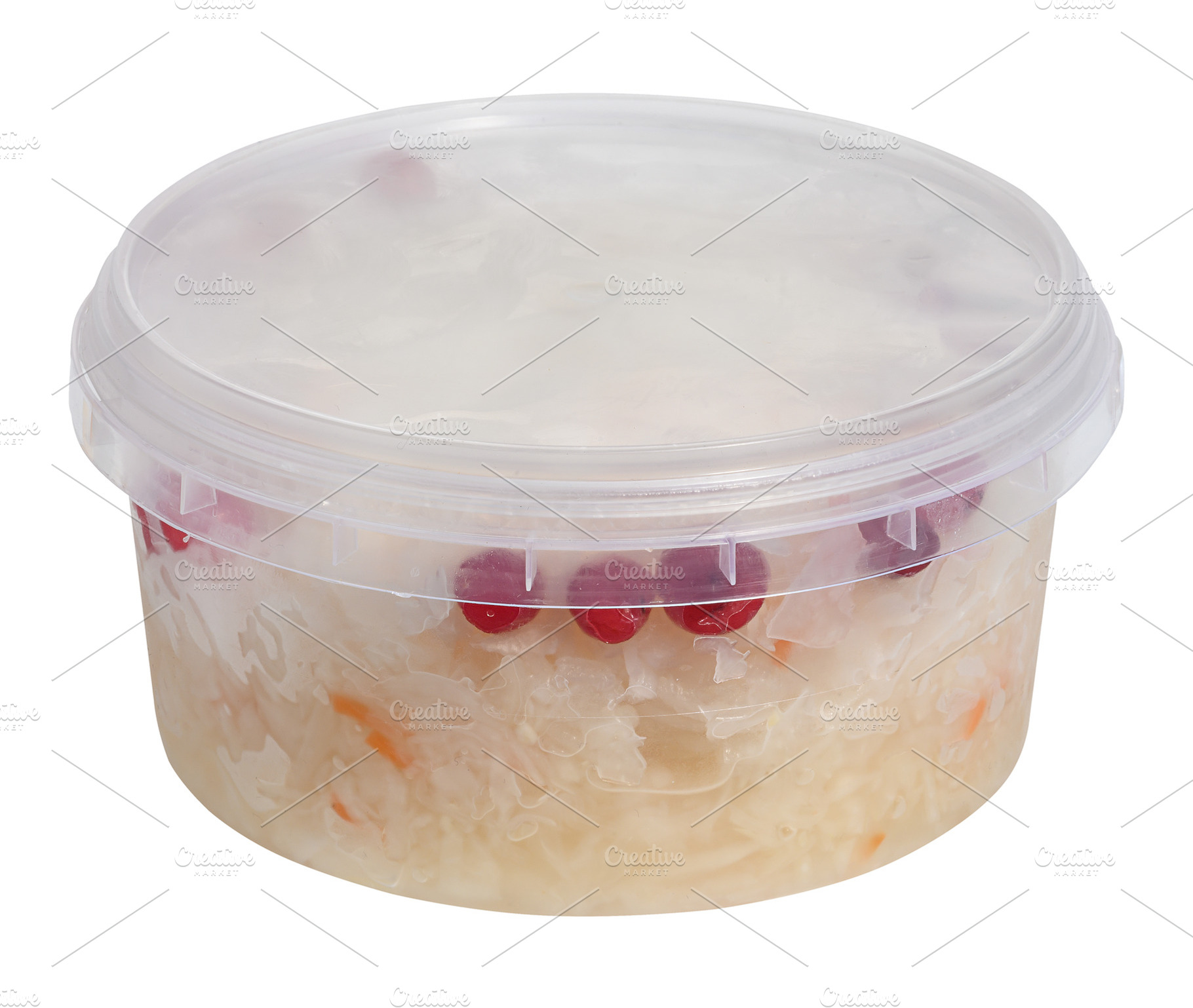 Sauerkraut with cranberries in a plastic container on an isolate, a Food & Drink Photo by ndanko
