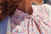 Woman wearing stylish floral blouse and casual blazer enjoying w, a Beauty & Fashion Photo by Studio ANNA (Thumbnail 2 of 2)