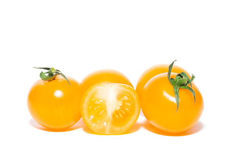 yellow tomatoes on white background, a Food & Drink Photo by AlexBush