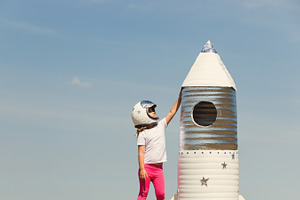 Happy child dressed in an astronaut