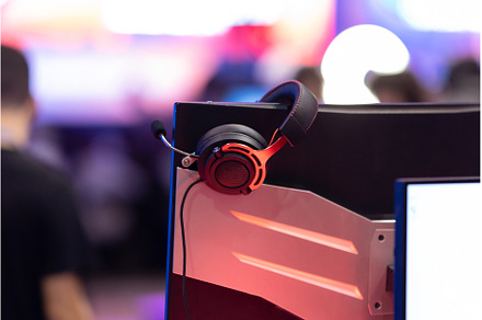 Gaming headphones put onto the, a Technology Photo by Barcelona_dreams