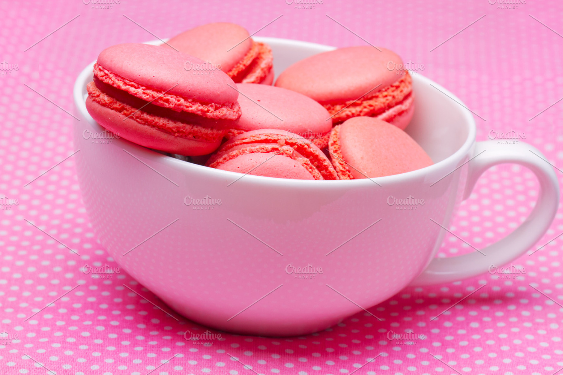 Macaroons in a cup featuring macaron, macaroon, and cookie