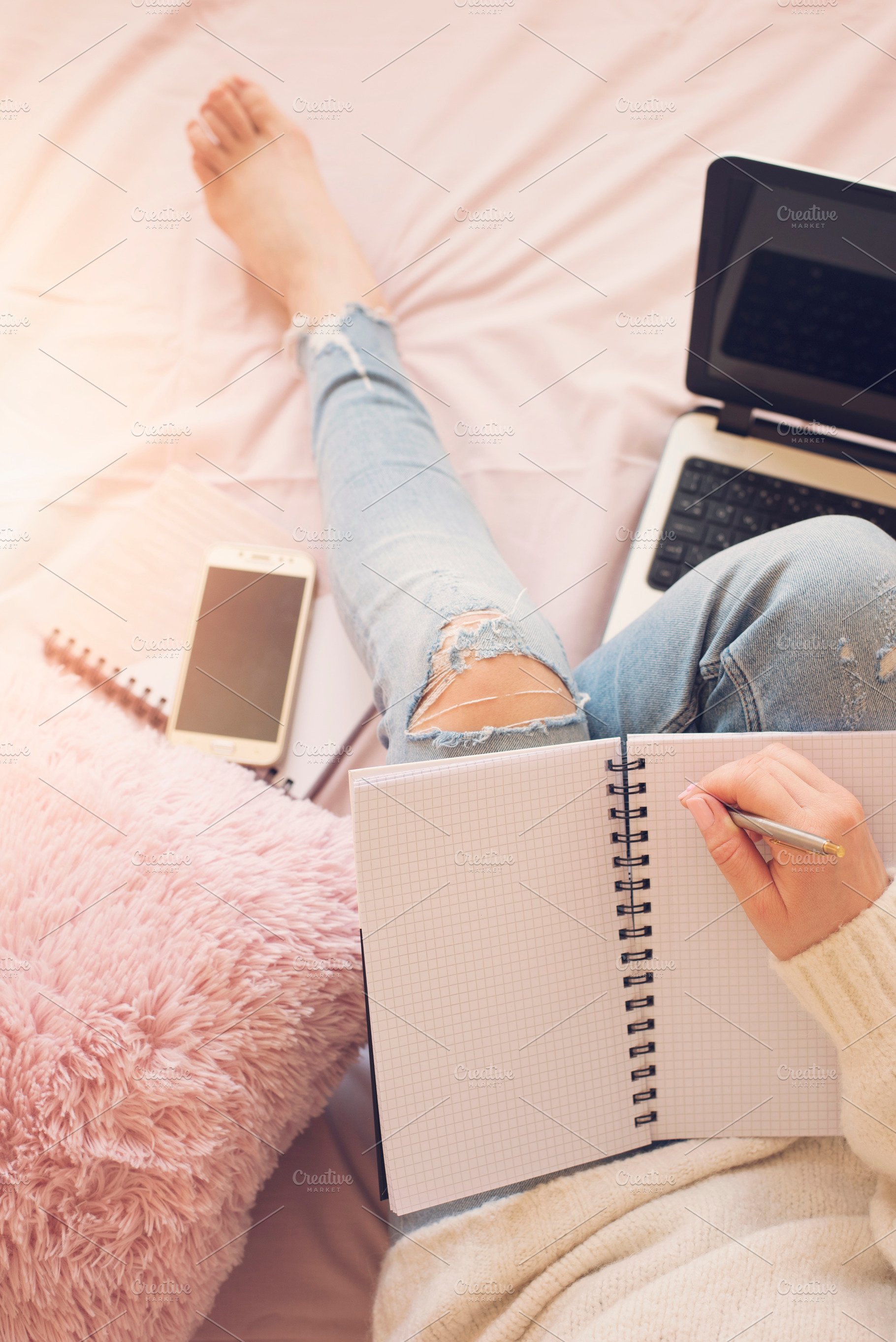 Feminine workplace concept featuring bed, woman, and writing, a Person Photo by MONNKA