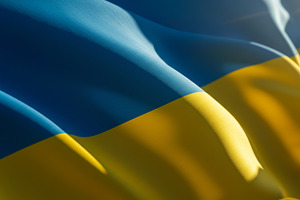 Ukrainian national flag waving in su, a Background Photo by professorinc