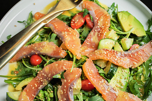 Salad with salted salmon and arugula, a Food & Drink Photo by Budarinphoto