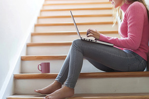 Using laptop on stairs, a Photo by Beautiful things