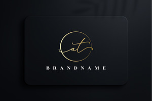 Letter AT Handwritten Signature Logo