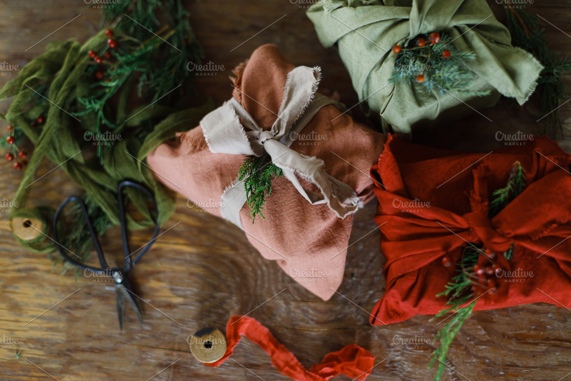 Merry Christmas! Stylish christmas presents wrapped in fabric wi, a Holiday Photo by Sonjachni