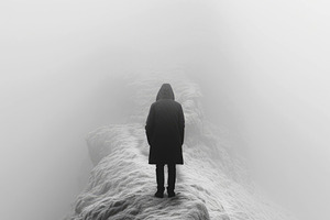 Solitary figure on narrow ridge in dense fog, minimal monochrome, an Abstract Photo by José Manuel Gelpi