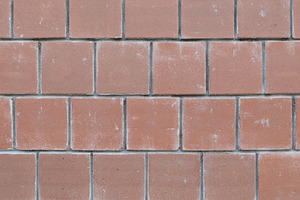 brown tiled brick wall background, a Photo by WorldOfPhotos