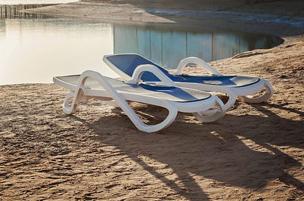 at sunset on the beach Two blue sunbeds, a Nature Photo by TanaCh