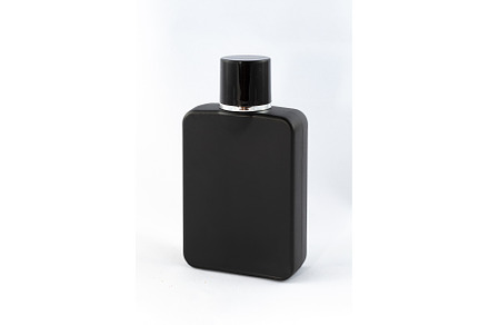 Black Matte Bottle of Perfume for, a Background Photo by InfinitumProdux