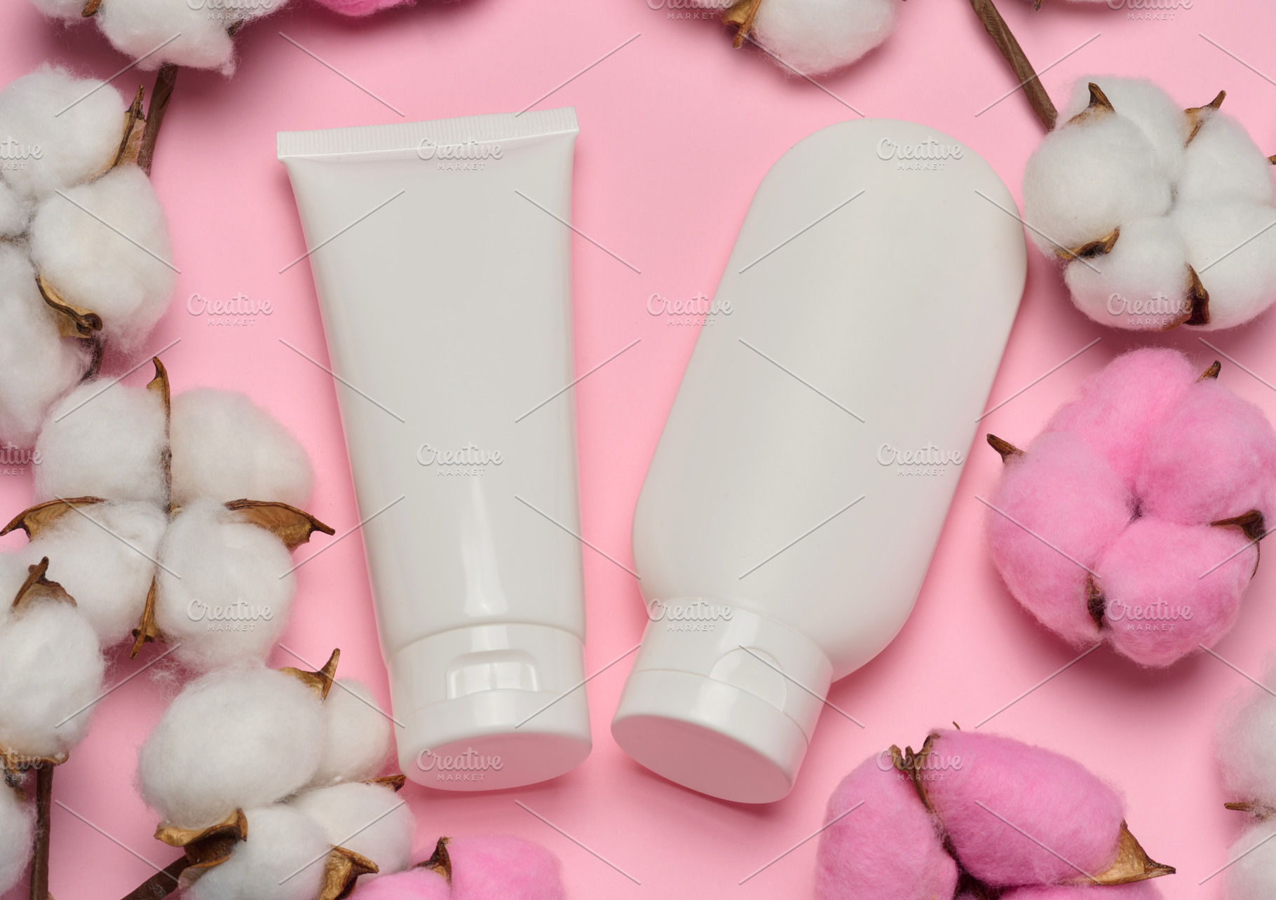 White plastic tube for cosmetics or cream on a pink background w, a Beauty & Fashion Photo by ndanko