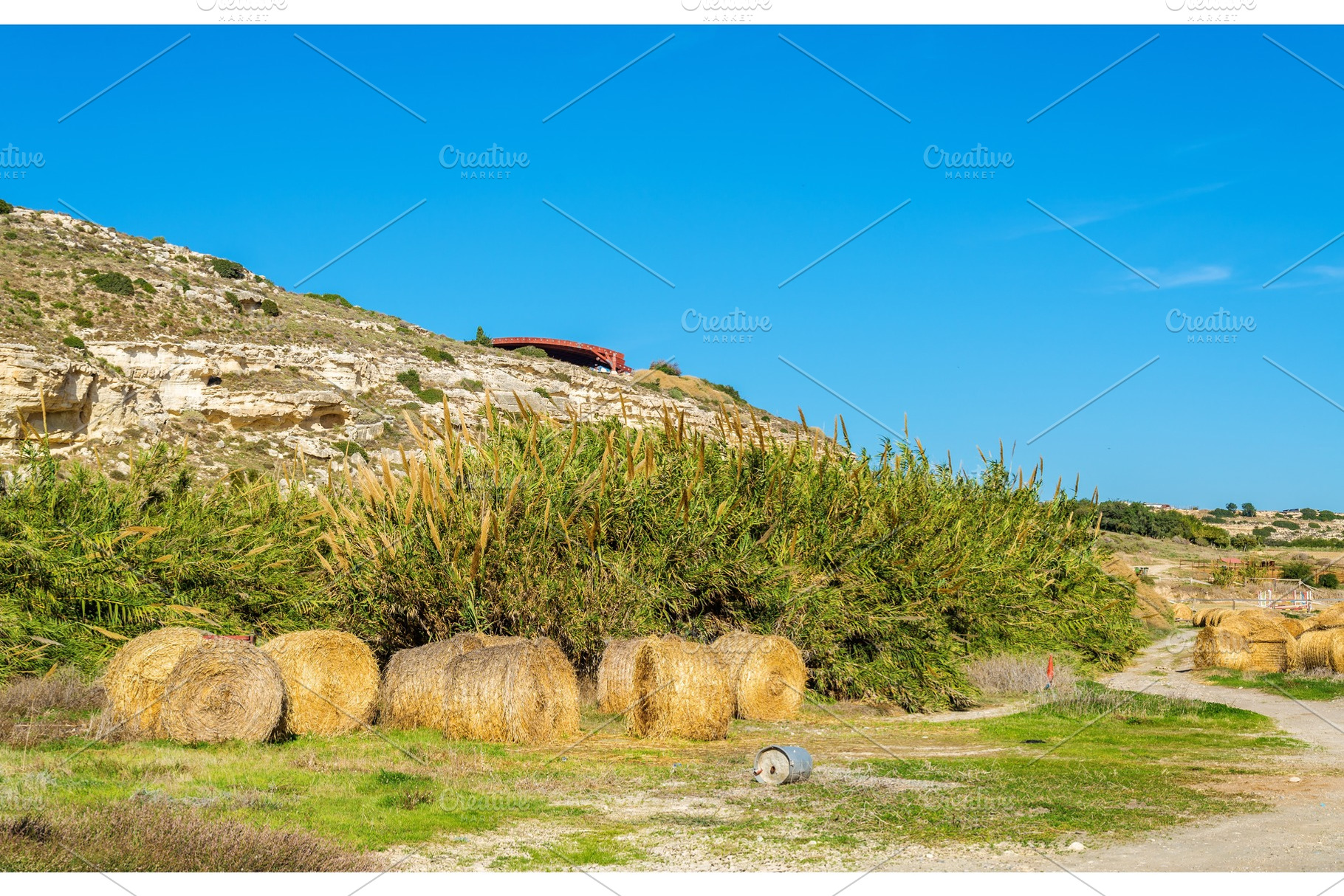 Haystacks at the foot of the Kourion Mount - Cyprus, a Nature Photo by Leonid Andronov